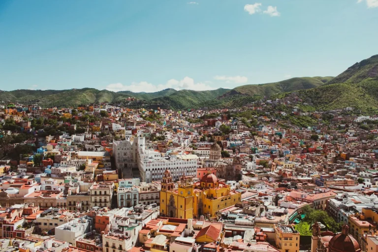 Aerial view of Guanajuato city with colourful hillside buildings